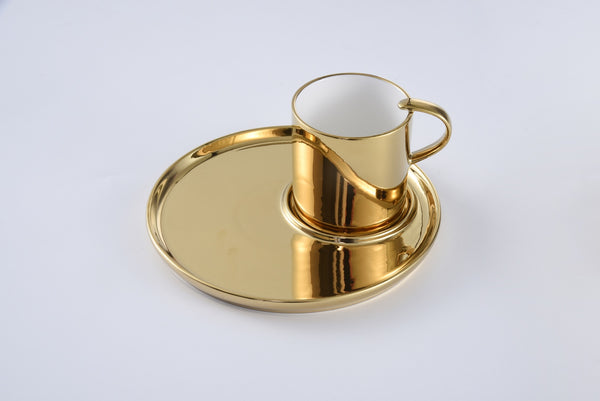 Golden cappuccino cup and plate